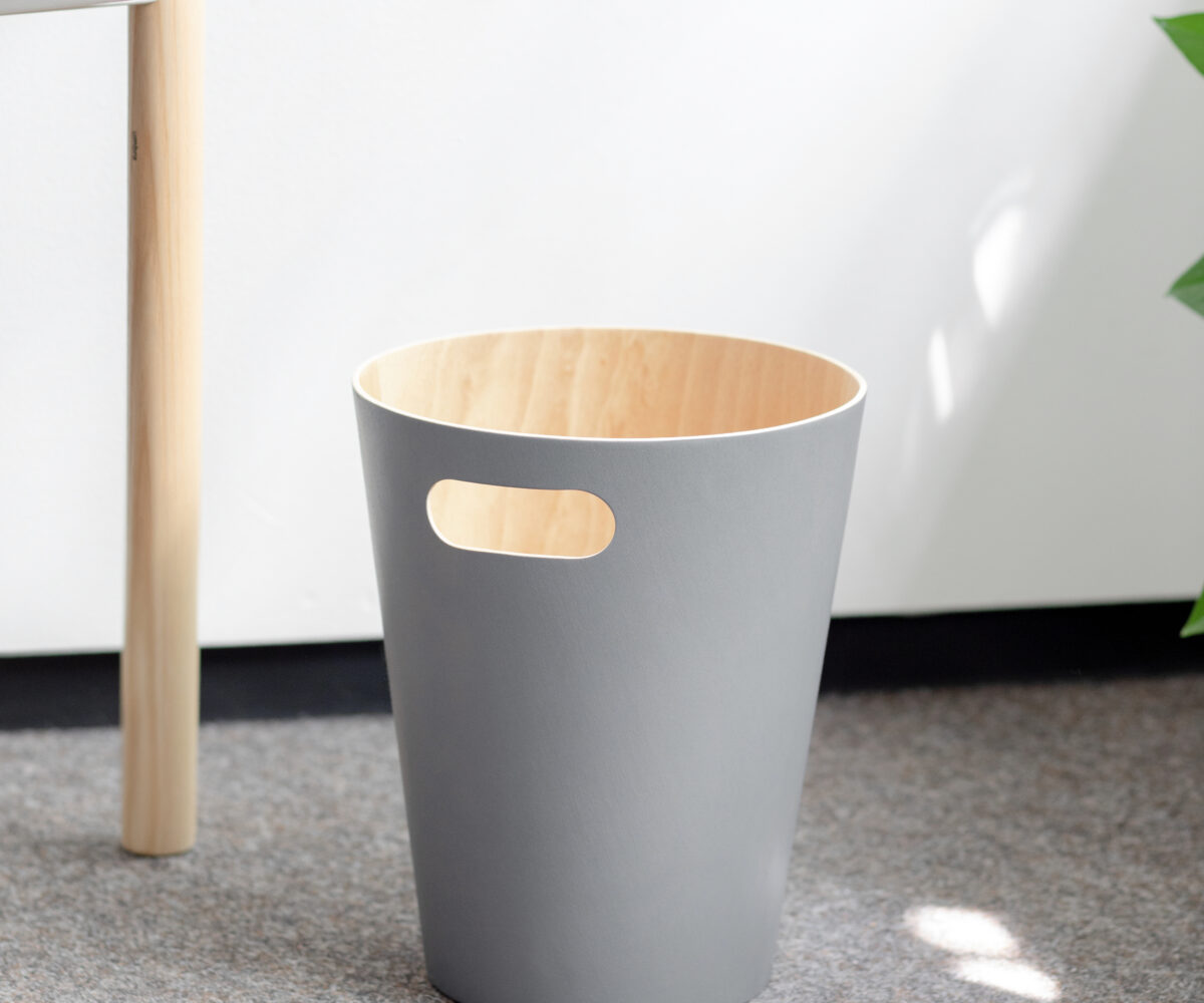 Woodrow is a contemporary waste can that adds a modern touch to any space. The two-tone can combines a natural wood interior with a stained finish on the outer surface